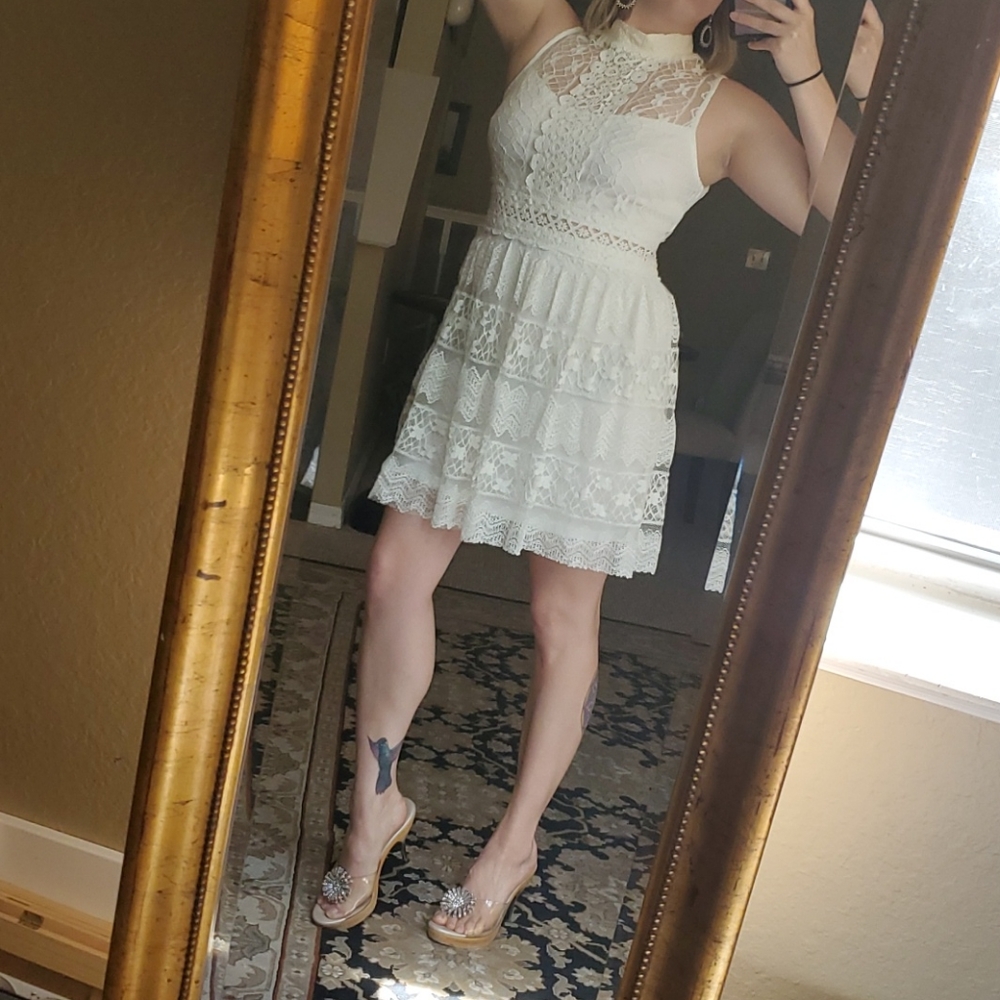 Lacey white brilliantly stitched dress